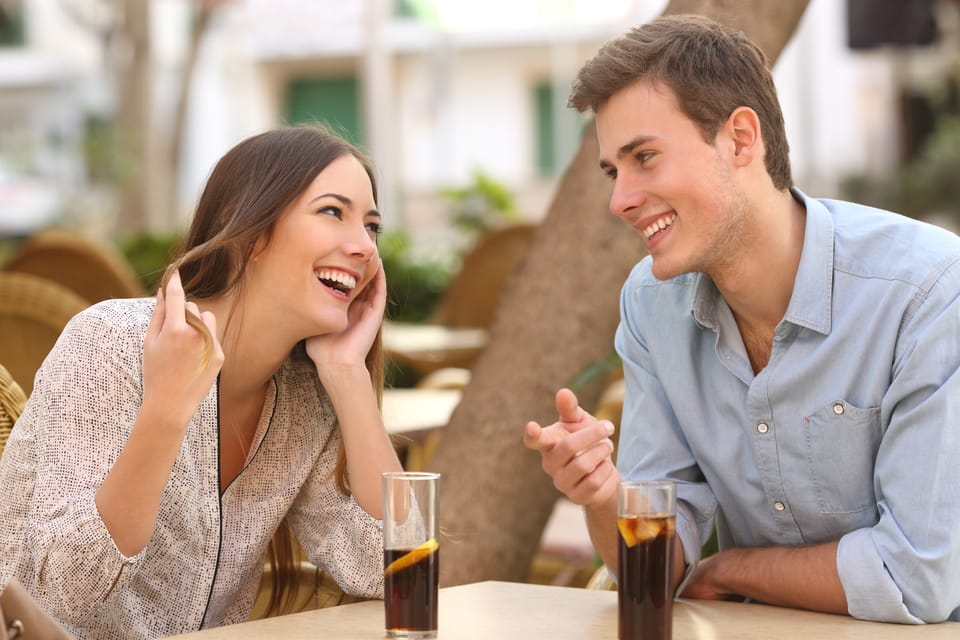 Couple dating and flirting in a restaurant.